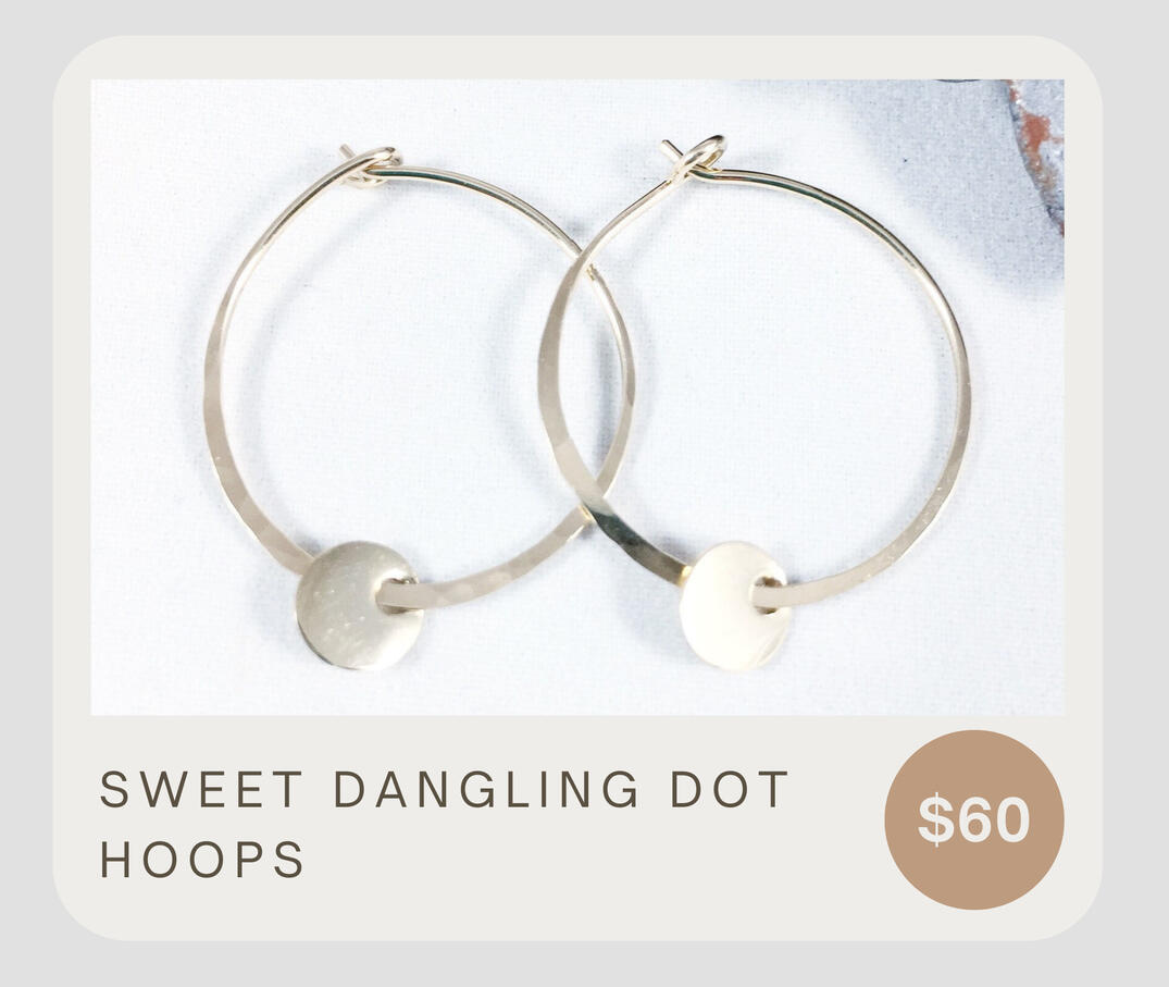 These 14k gold filled hoop earrings with hanging discs are beautiful, lightweight and minimalist. The small hanging discs glisten delightfully with every move. Earrings measure approximately ⅞” in diameter.