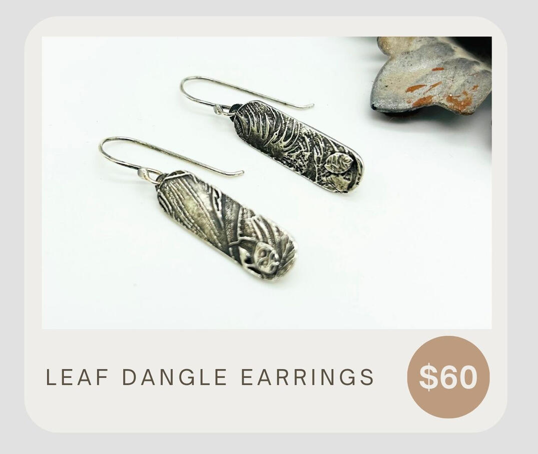 Plant earrings with decorative leaf additions. These lightweight oval botanical earrings hang from hand crafted .925 ear wires and are fun to wear while they catch the eye with their movement. Handmade artisan earrings. Great gift idea for her.
