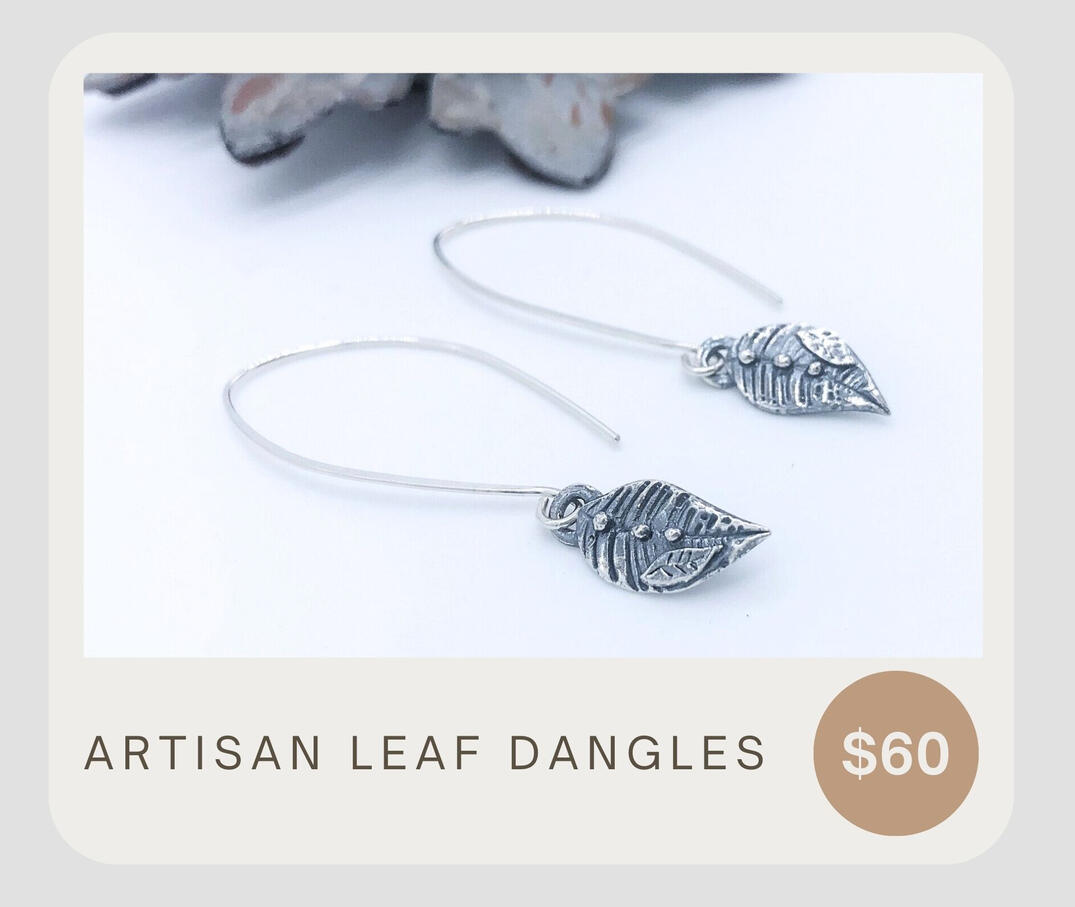 Artisan dainty leaf earrings. These handmade layered leaf hoops were made from recycled .999 fine silver with handcrafted .925 sterling silver ear wires.