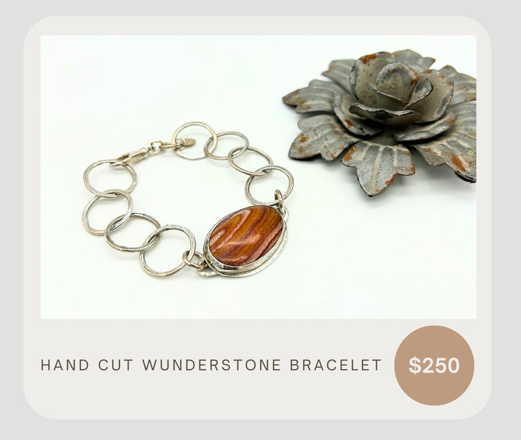 Hand cut Wunderstone in a .925 setting and .999 silver artisan handmade links. Gorgeous, one of a kind bracelet that is sure to catch the eye!