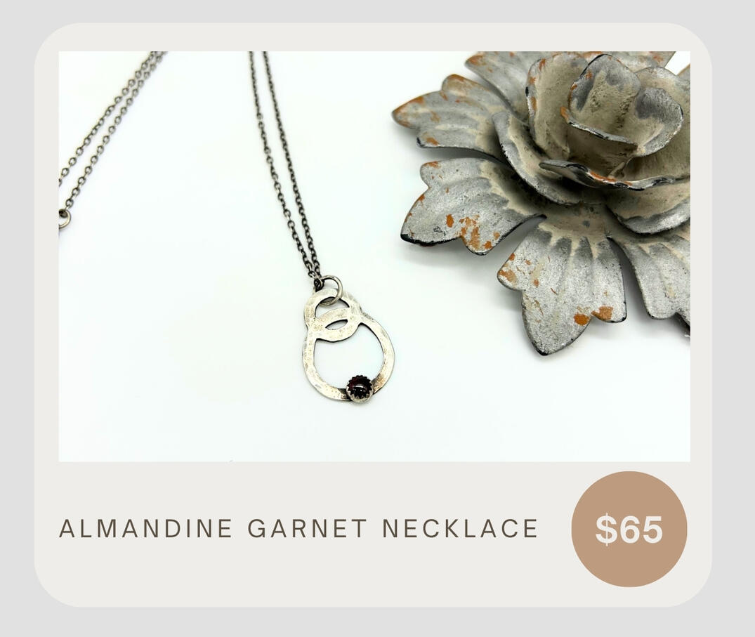 Almandine Garnet Necklace with .999 silver setting and .925 silver. The perfect necklace to dress up your outfit on any given day.