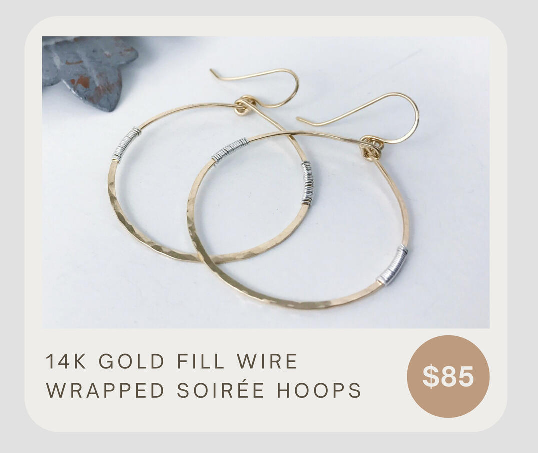 Artisan 14k gold fill hammered hoops with sterling silver wire wrapped accents. The hoops are about 1 5/8 inches and dangle about 2 1/4 inches. These are chic hoops that are sure to impress!