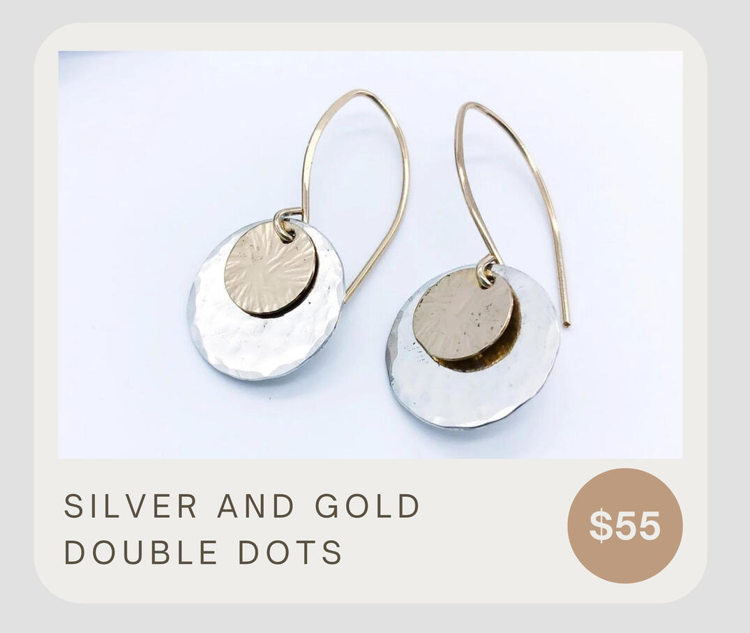 Handmade mixed metal 14k gold fill and sterling silver discs with 14k gold filled ear wires. These dangle about 1 1/2 inches and are about 5/8&quot; wide. These are simply classy artisan earrings for many occasions.