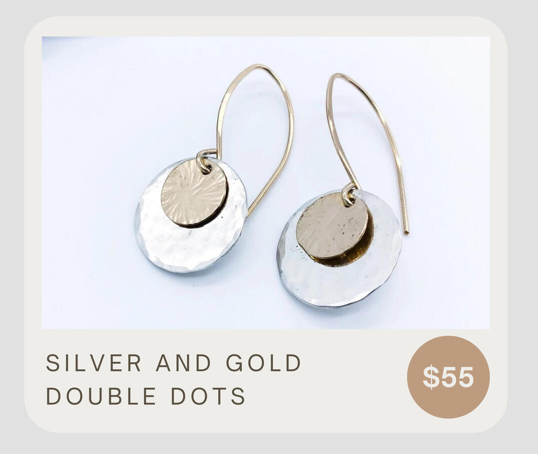 Handmade mixed metal 14k gold fill and sterling silver discs with 14k gold filled ear wires. These dangle about 1 1/2 inches and are about 5/8" wide. These are simply classy artisan earrings for many occasions.