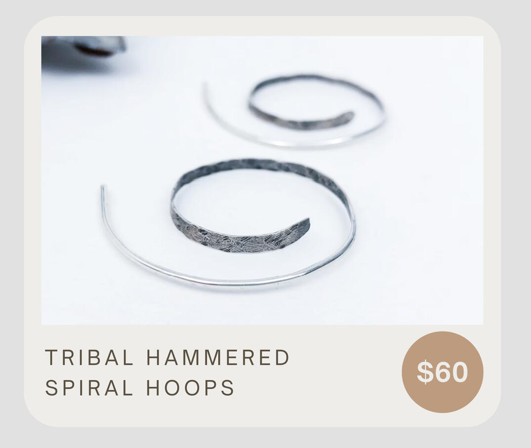 Artisan hammered spiral hoops! These tribal sterling silver hoop earrings are lightweight and comfortable. These spiral hoops dangle 1 1/4 inches. Each pair is handmade from raw sterling silver wire and are hammered, textured, oxidized, and tumbled.