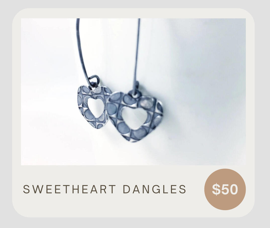 These silver 999 earrings are lightweight, dainty and fun! The heart displays a raised pattern filled with sweet dots, attached to a handmade ear wire. Full earring measures apprx 1 9/16”, heart measures apprx 9/16” inches in height and ⅝” wide.