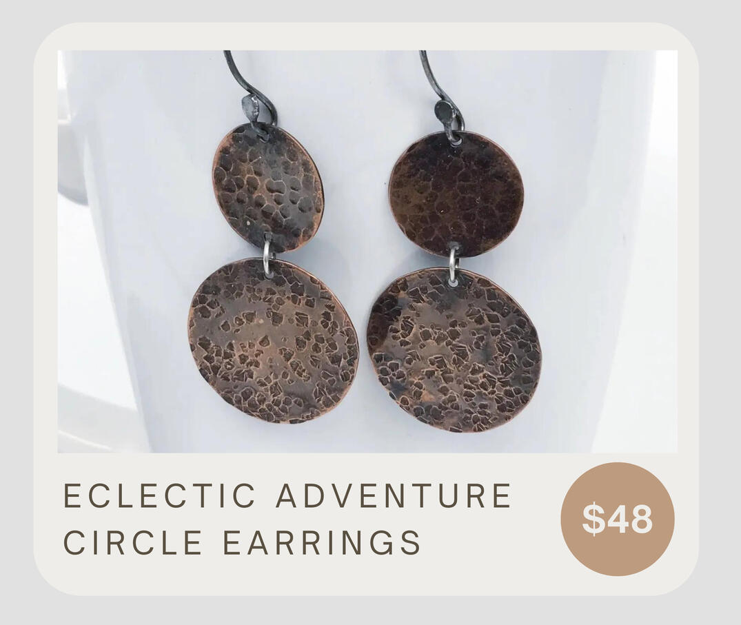 These tribal copper disc earrings hang from handmade 925 sterling silver ear wires. Eye-catching textures on each discs! These dangle about 2 inches from top to bottom and the discs are about 5/8 and 7/8 inches in diameter.