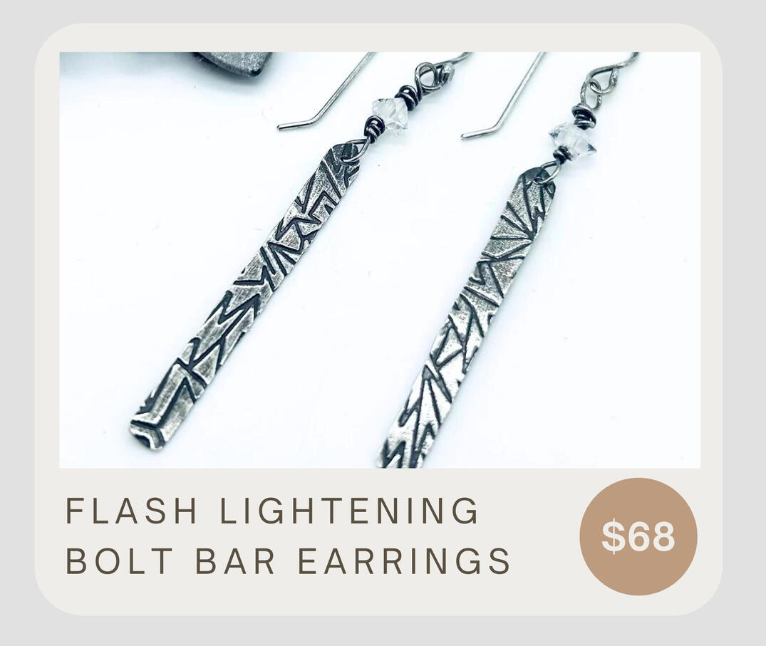 Crafted from a recycled ingot of sterling silver, these dangle earrings feature Herkimer diamonds, rolled wire accents, and a roller printed finish.