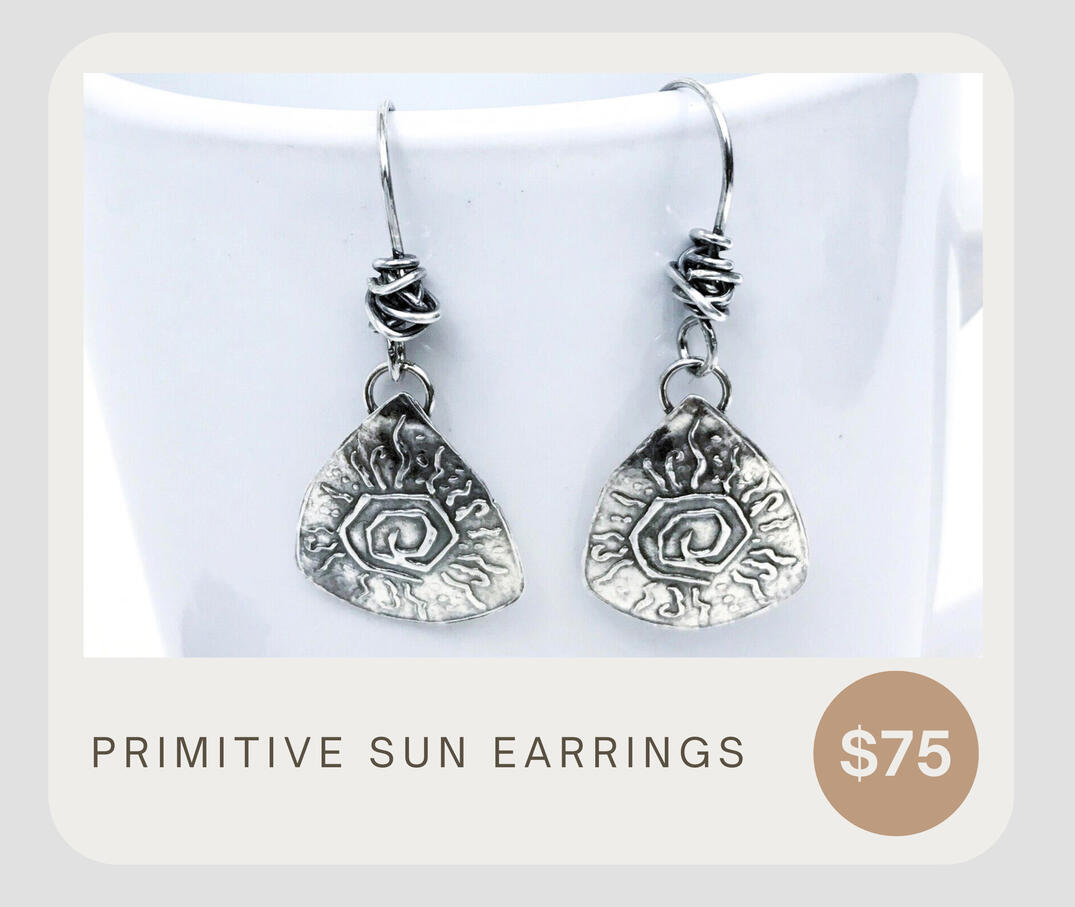 Fun and funky tribal earrings. Rustic handmade fine silver chandelier earrings with hand drawn tribal sun designs. First I created a drawing and then I created a custom impression. The wire wrapping adds dimension and interest. .999 Fine Silver