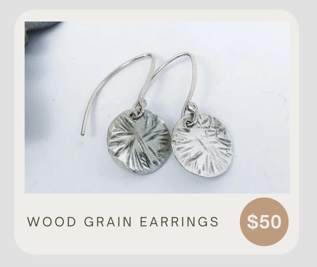 Wood grain earrings. Simple and small hammered disc earrings. These sweet earrings will compliment many outfits. These dangle about 1 1/8 inches from top to bottom. The .925 discs are about 4/8 inches wide.
