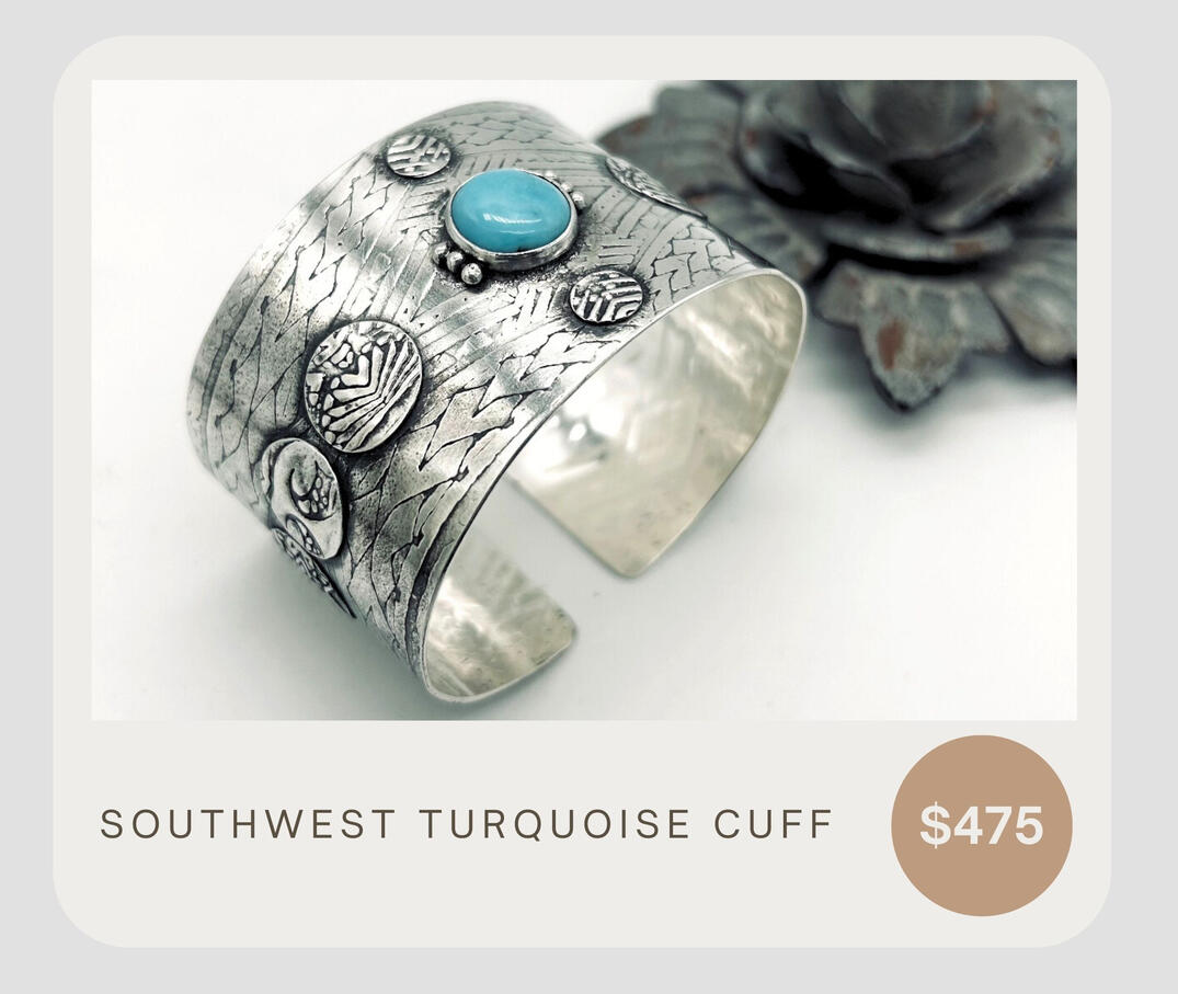 Stunning .925 sterling silver cuff bracelet with a Southwestern design. This cuff was roller printed, with handmade sterling disc embellishments and a turquoise cabochon.