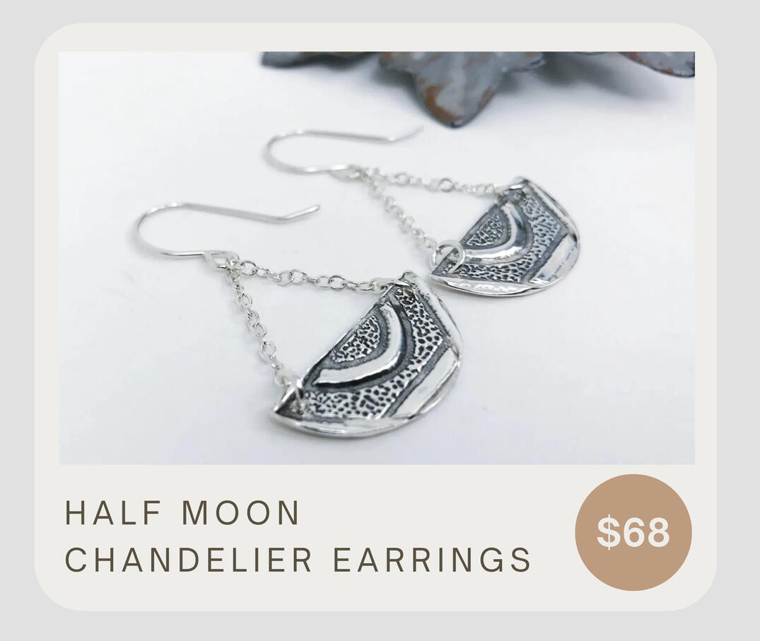 These rustic handmade .999 fine silver lemon slice earrings have a geometric pattern on the front and a shiny back. A modern geometric tribal feel. These dangle about an 1 6/8 inches and the half moon discs measure about 1 by 1/2 inches.
