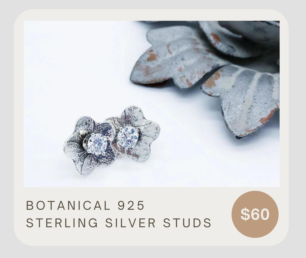 These handmade clear cubic zirconia gemstone post earrings have real flower impression backgrounds with stunning diamond-like sparkling clear cubic zirconia prong settings. These are made from 925 sterling silver wire. The disc studs are about 5/8 in.