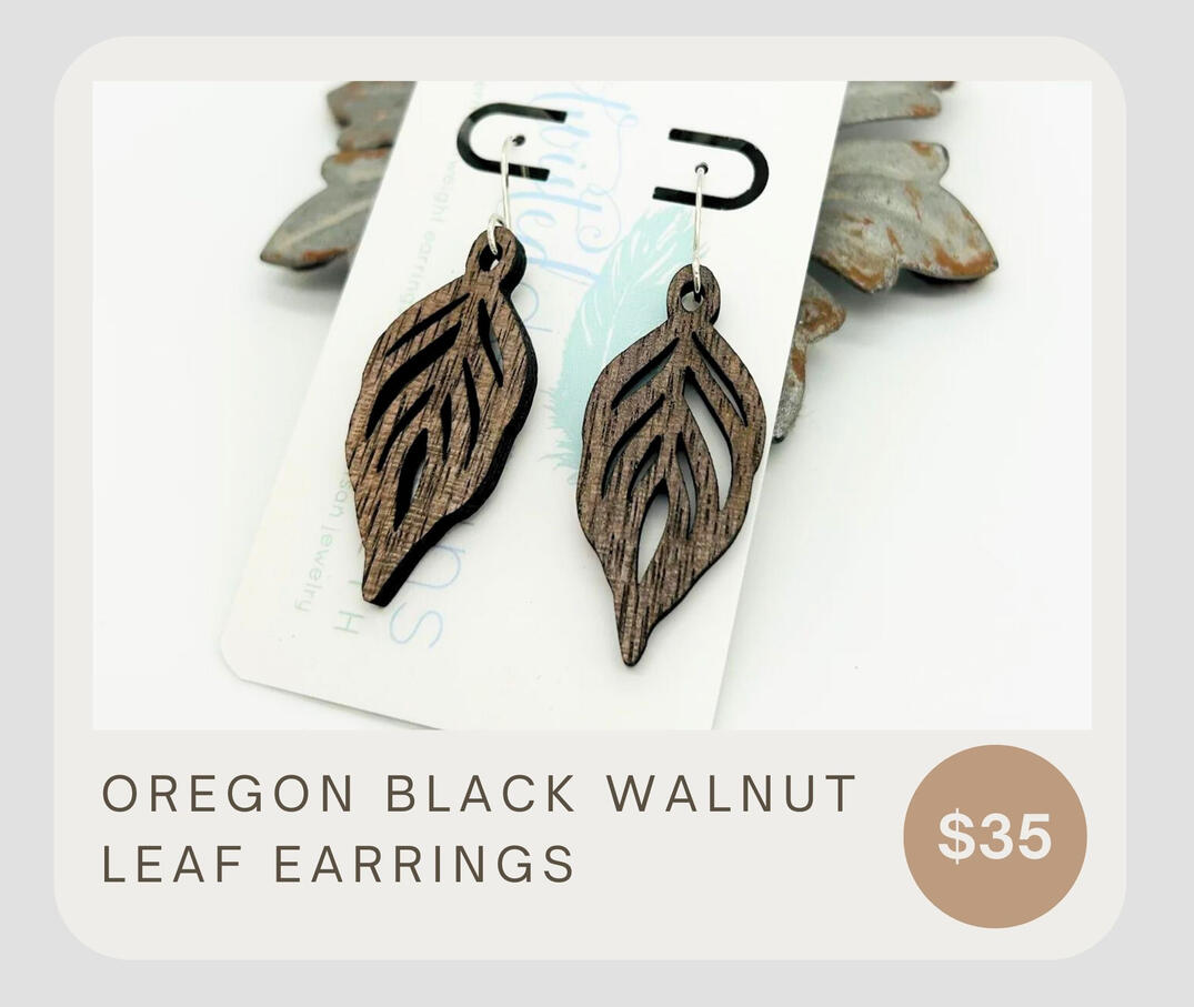 Laser cut leaf earrings made from Oregon grown Black Walnut complete with sterling silver ear wires.