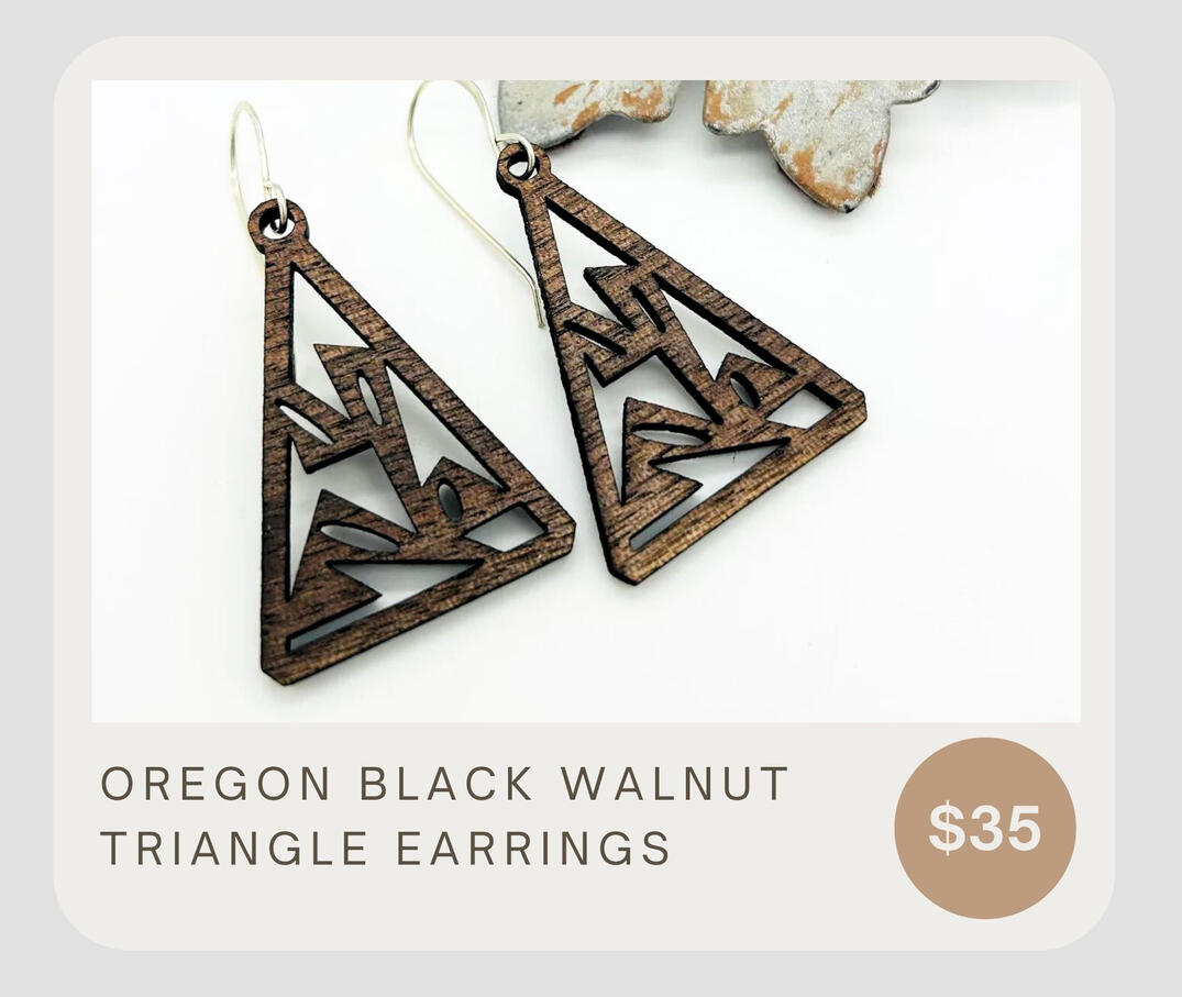 Oregon Black Walnut Triangle Earrings combine the timeless style of sterling silver ear wires with locally sourced Oregon black walnut for a beautiful addition to any outfit.