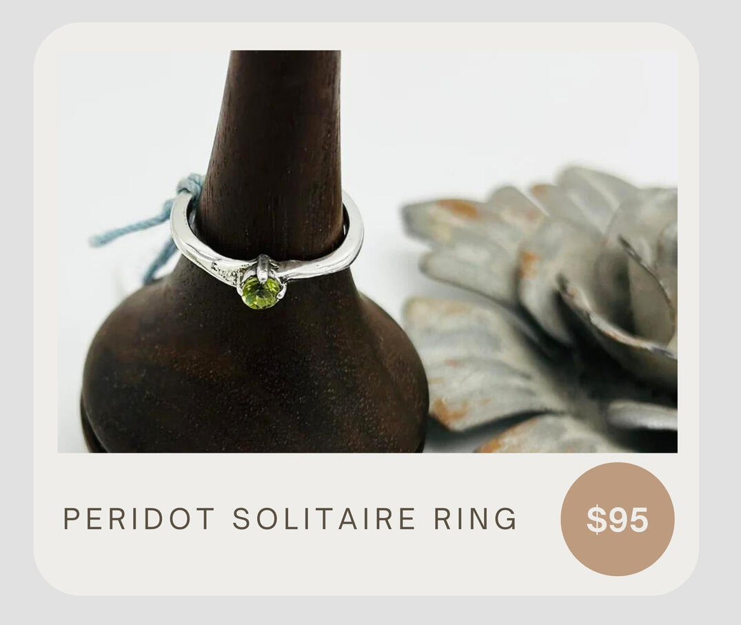 The Twisted Designs Peridot Solitaire Ring showcases a stunning, peridot gemstone set in sterling silver. Its solitaire design is simple and elegant, perfect for any occasion.