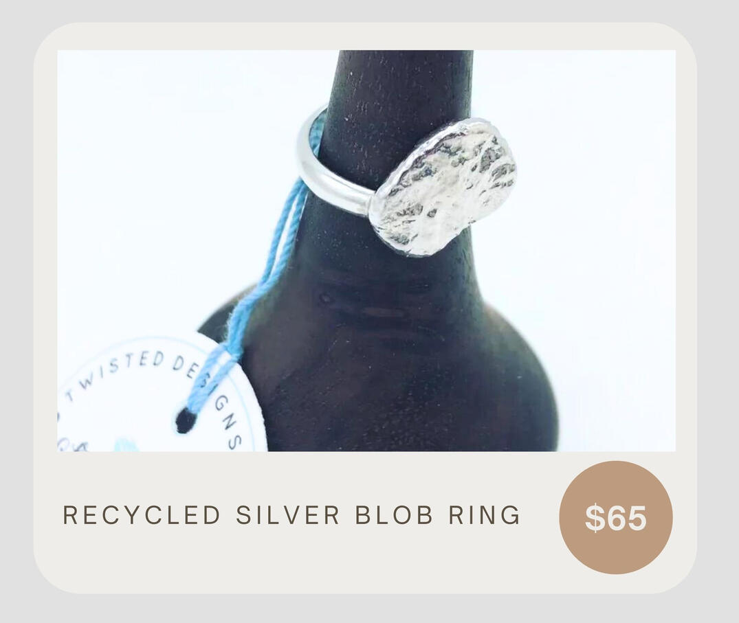Made from recycled sterling silver this ring features a textured non-symmetrical circle top.