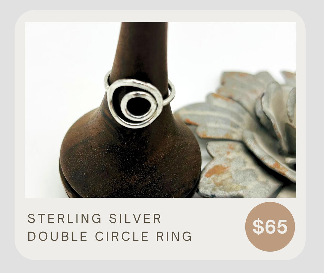 Sterling silver double circle ring. This beautiful ring is light and elegant and perfect for any occasion. This ring is made to order and you will be able to specify your size at checkout.